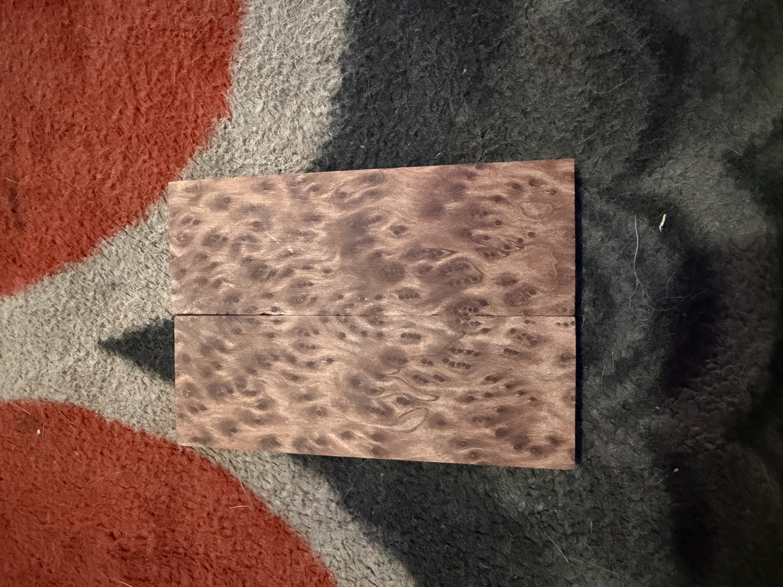 Two figured burl wood handle scales prepared for a custom knife